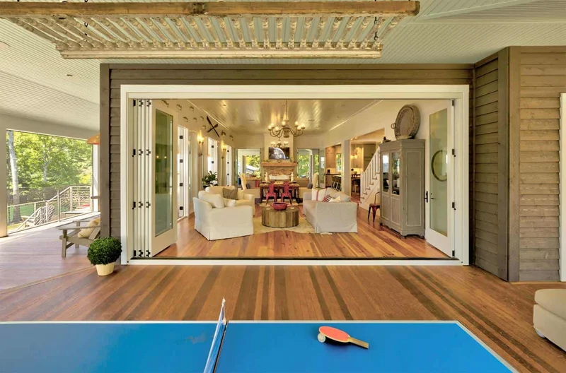 NanaWall glass doors easily retract to open up entertaining spaces and bring the outdoors in.