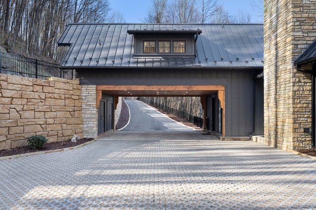 Carriage House Charmer driveway with covered carport