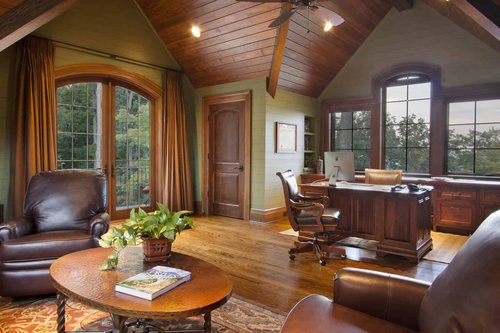 This in-home office also offers a cozy sitting area to welcome guests.