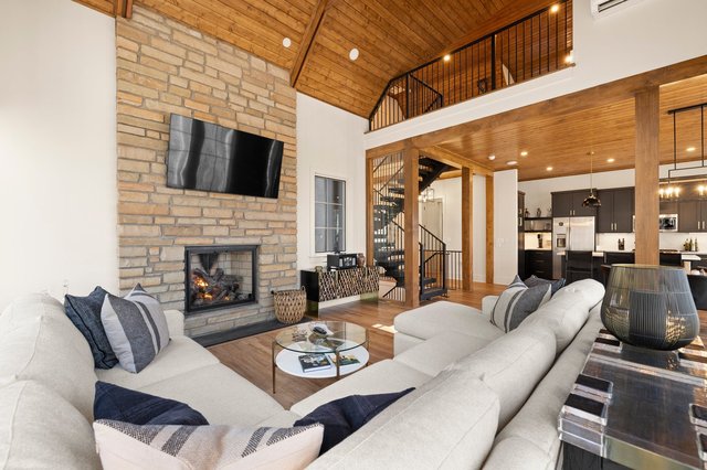 Carriage House Charmer living area with fireplace