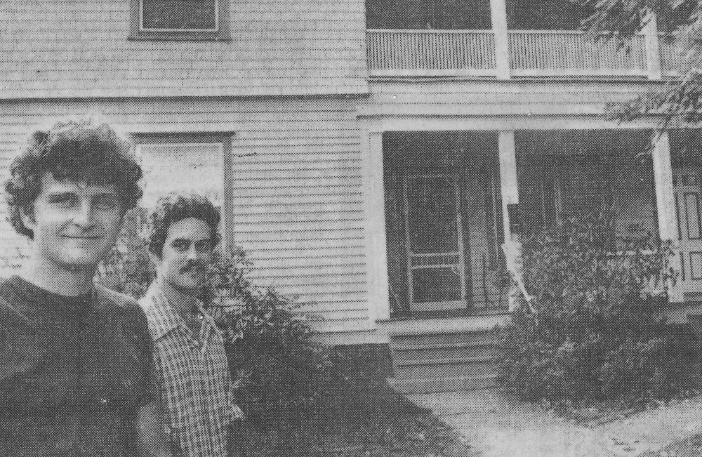 Photo of Malcolm and Kevin in front of a duplex renovation in 1981