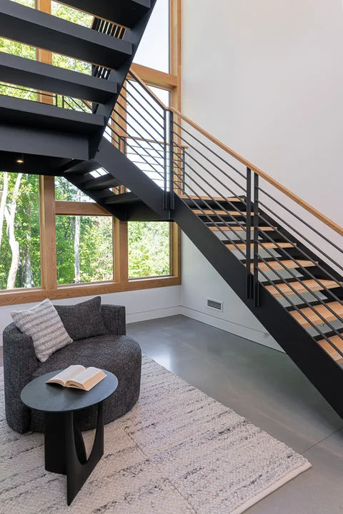 Reading nook under stairs in Lake Toxaway Modern Custom Home