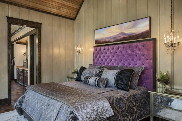 Maison de Montagne Master Bedroom with Purple Headboard