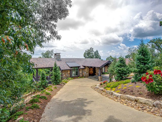 Ridgeview Exterior Side View with Driveway and Landscaping