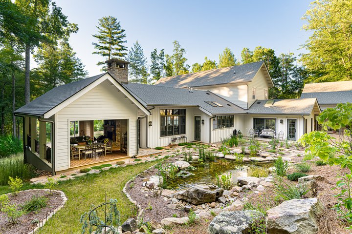 Modern Farmhouse Exterior with Pond